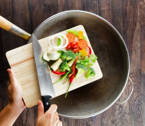 chef cooking vegetables